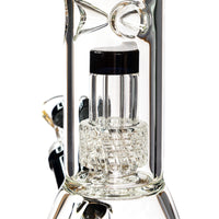 Macro detail view of the precision cut glass matrix percolator and black glass cap inside the straight chamber.