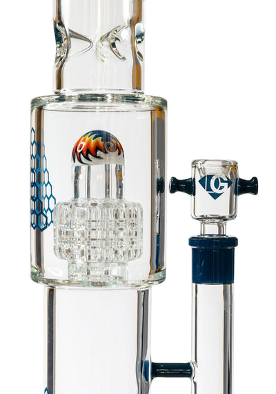 Close up view of the gridded matrix percolator with a colorful wig-wag glass dome and blue accented 14mm joint.